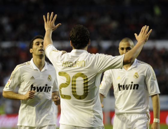Gonzalo Higuain C celebrates after scoring Real's third against Osasuna