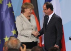 Merkel y Hollande apuestan por que Grecia se quede en la zona euro
