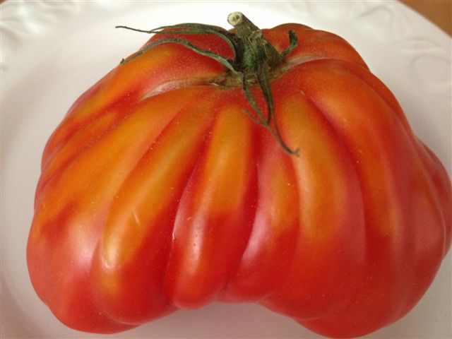 como cortar tomate rosa como cortar tomate rosa