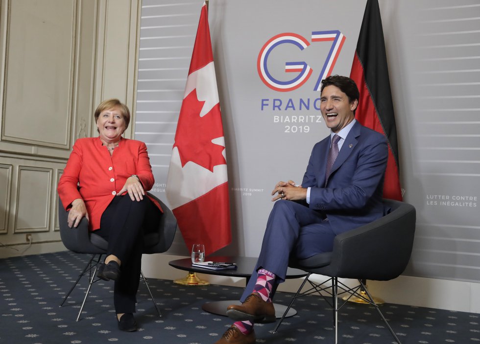 La canciller alemana, Angela Merkel, junto al primer ministro de CanadÃ¡, Justin Trudeau, durante la segunda jornada del G7, este domingo.